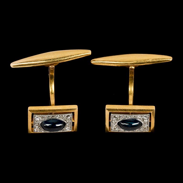 CUFFLINKS, blue cabochon cut sapphires set with small diamonds. St Petersburg, early 20th century.
