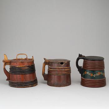 Three painted wooden jars from the 19-20th century.