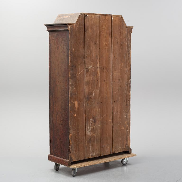 A Swedish painted cupboard dated 1863.