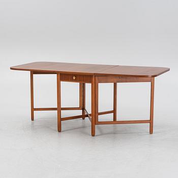 A mahogany veneered gate-leg table, second half of the 20th Century.