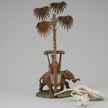 An early 20th century colonial style table lamp.