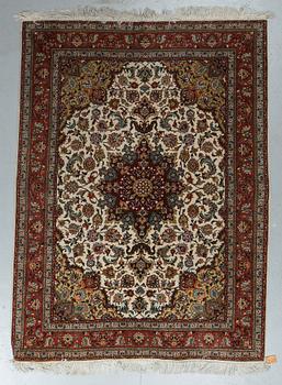 A rug, Old Tabriz, part silk, ca204 x 152 cm.