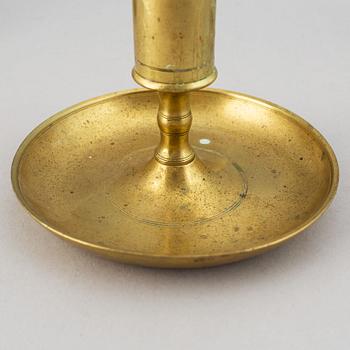 A set of six 19th-century brass candlesticks.