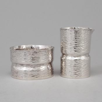 A silver Sugar bowl and a creamer by MICHAEL CHAVANNE, Stockholm 1977.