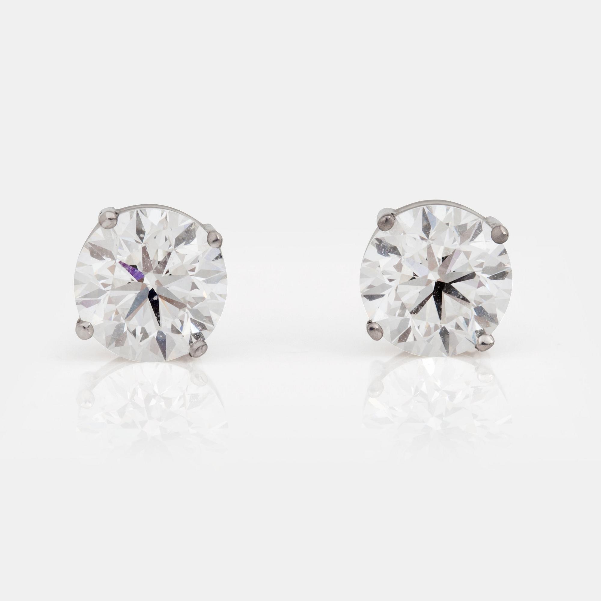 A pair of earrings with brilliant-cut diamonds 3.02cts in total, quality G/VS2. Certificates from IGI.
