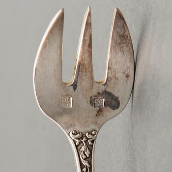 A set of 12 silver plated oyster forks from the early 20th Century.