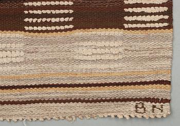 RUG. "Schackrutig, brun". Knotted pile in relief. 240 x 141 cm. Signed AB MMF BN.