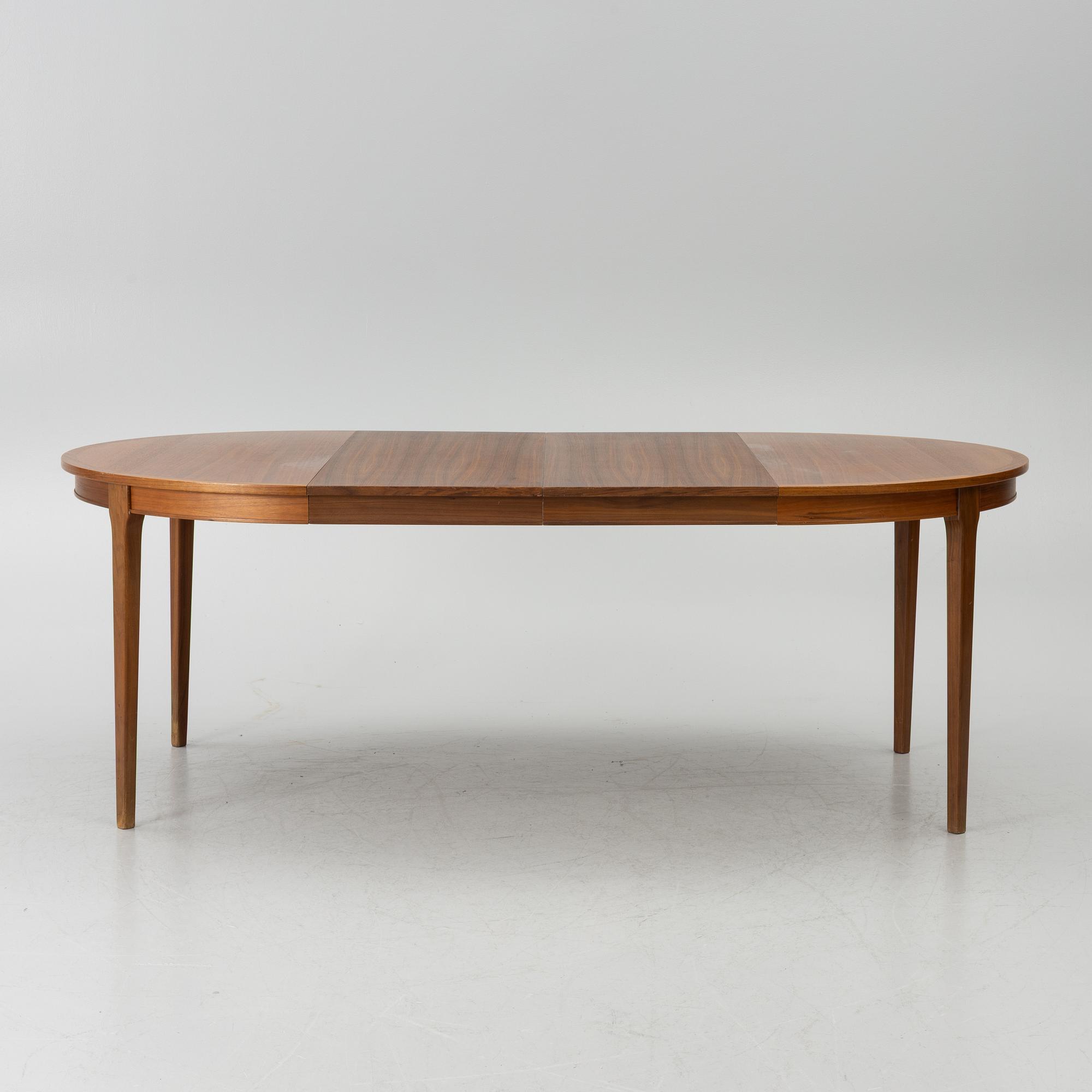 Linde Nilsson, dining table with eight chairs, Lammhult, second half of the 20th century.