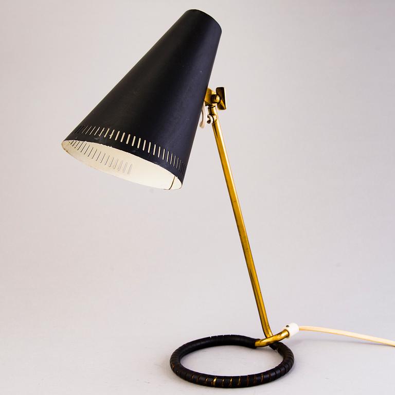 A mid-20th-century table lamp, model  K11-15 for Idman, Finland.