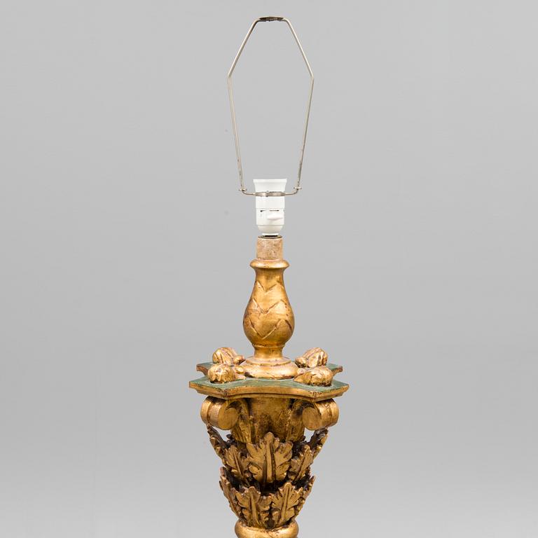 A Baroque style 1920s standard lamp.
