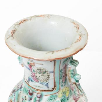 A group of three famille rose vases, Qing dynasty, late 19th century.