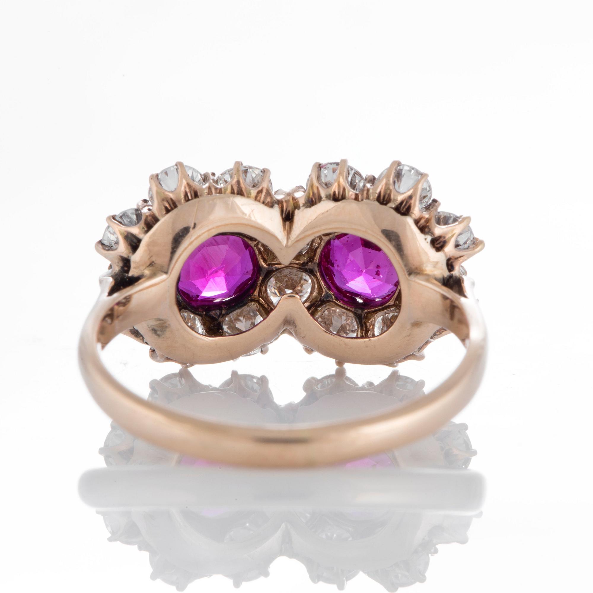 Ring med två fasettslipade rubiner total vikt ca 0.85 ct och runda briljantslipade diamanter.