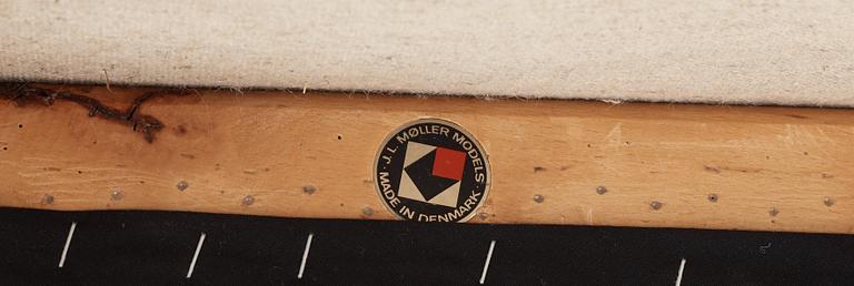 A Niels Ole Møller palisander dining table and nine chairs, J.L. Møller, Denmark 1950's-60's.