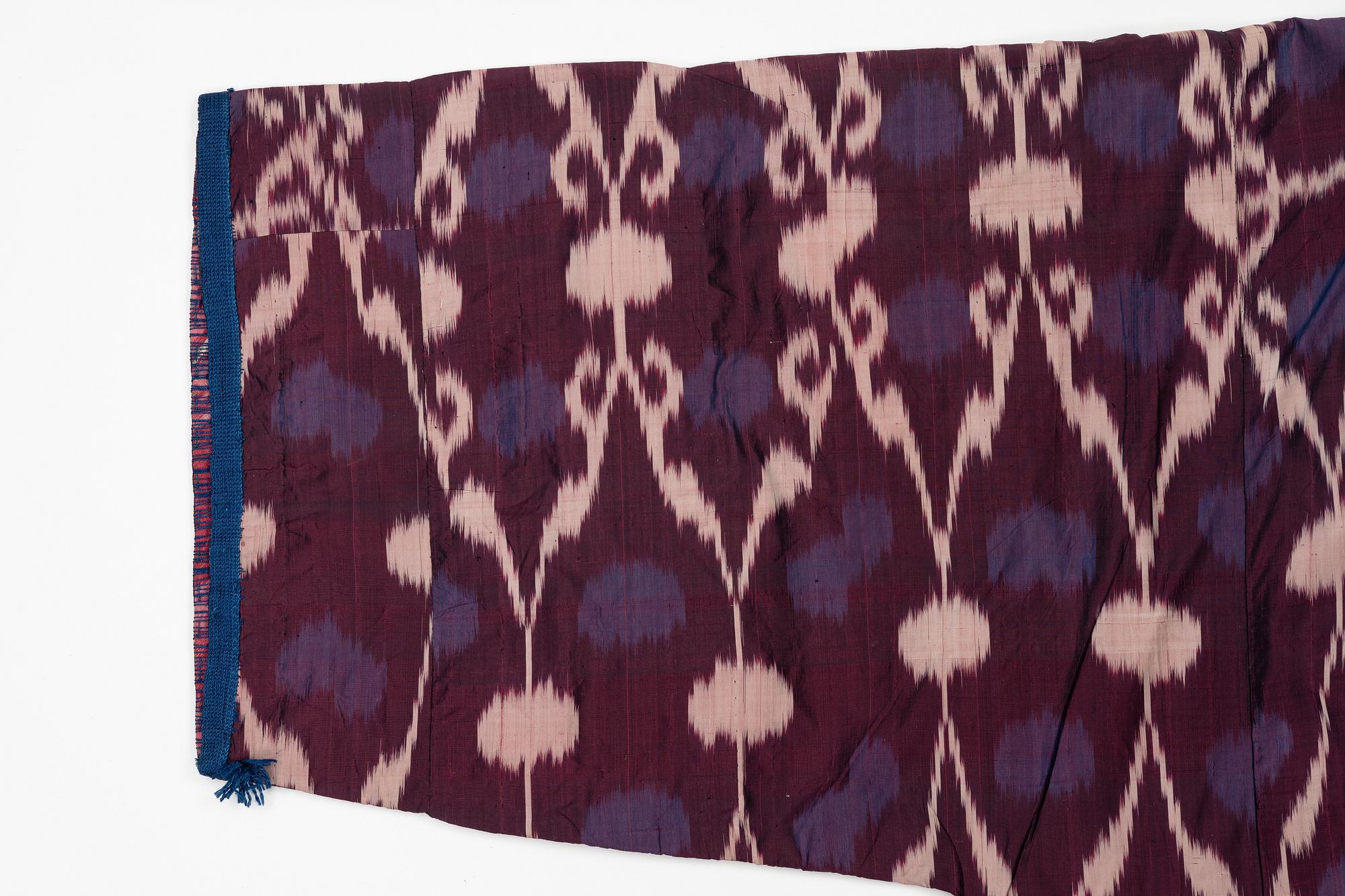 A silk Ikat Chapan, Central Asian, 1880s.