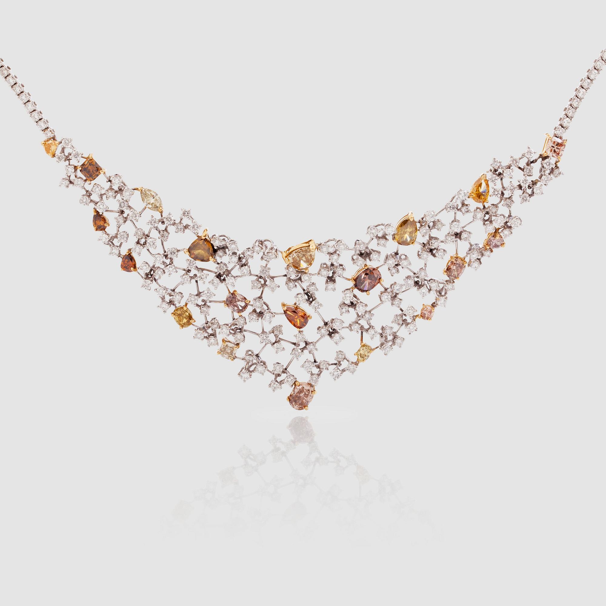 A Fancy coloured and white diamond necklace. Total carat weight circa 18.63 cts. 4 Certificates.