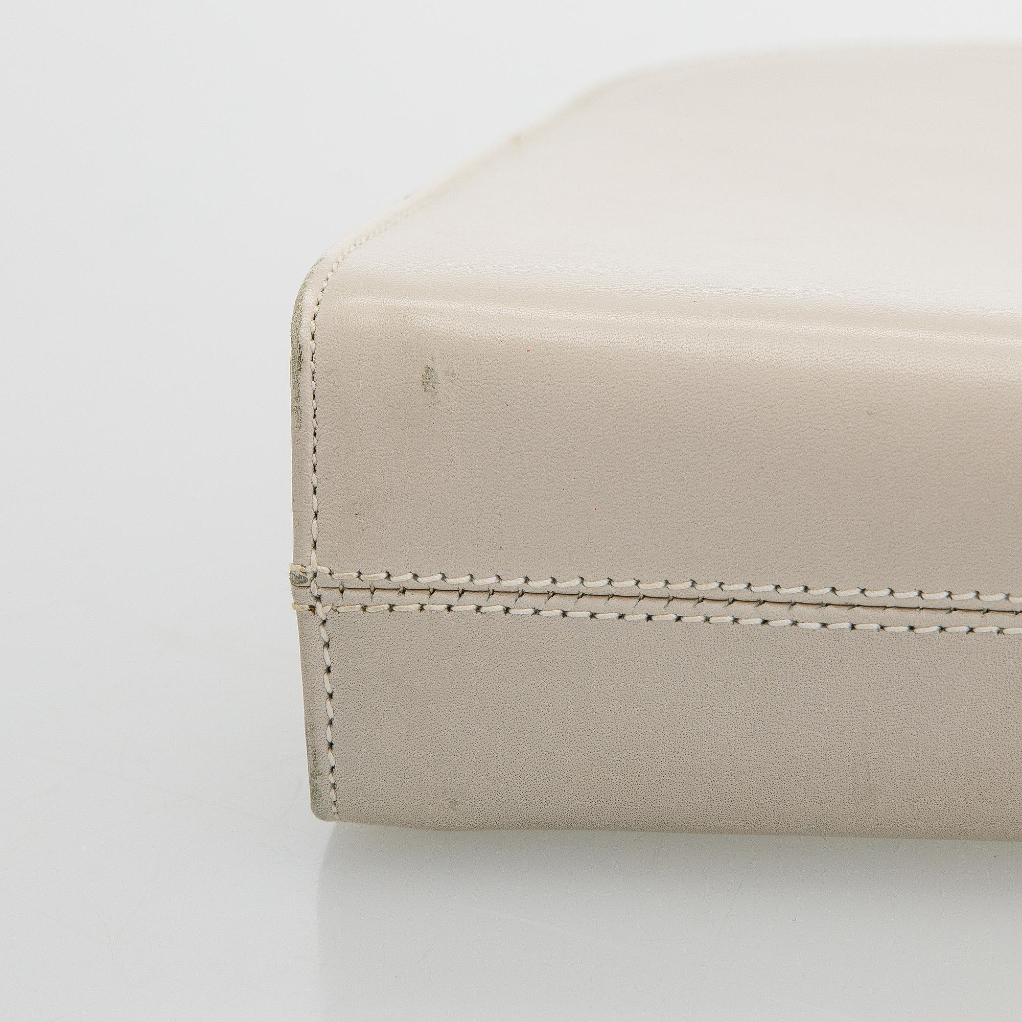 Salvatore Ferragamo, a leather “Gancini”bag.