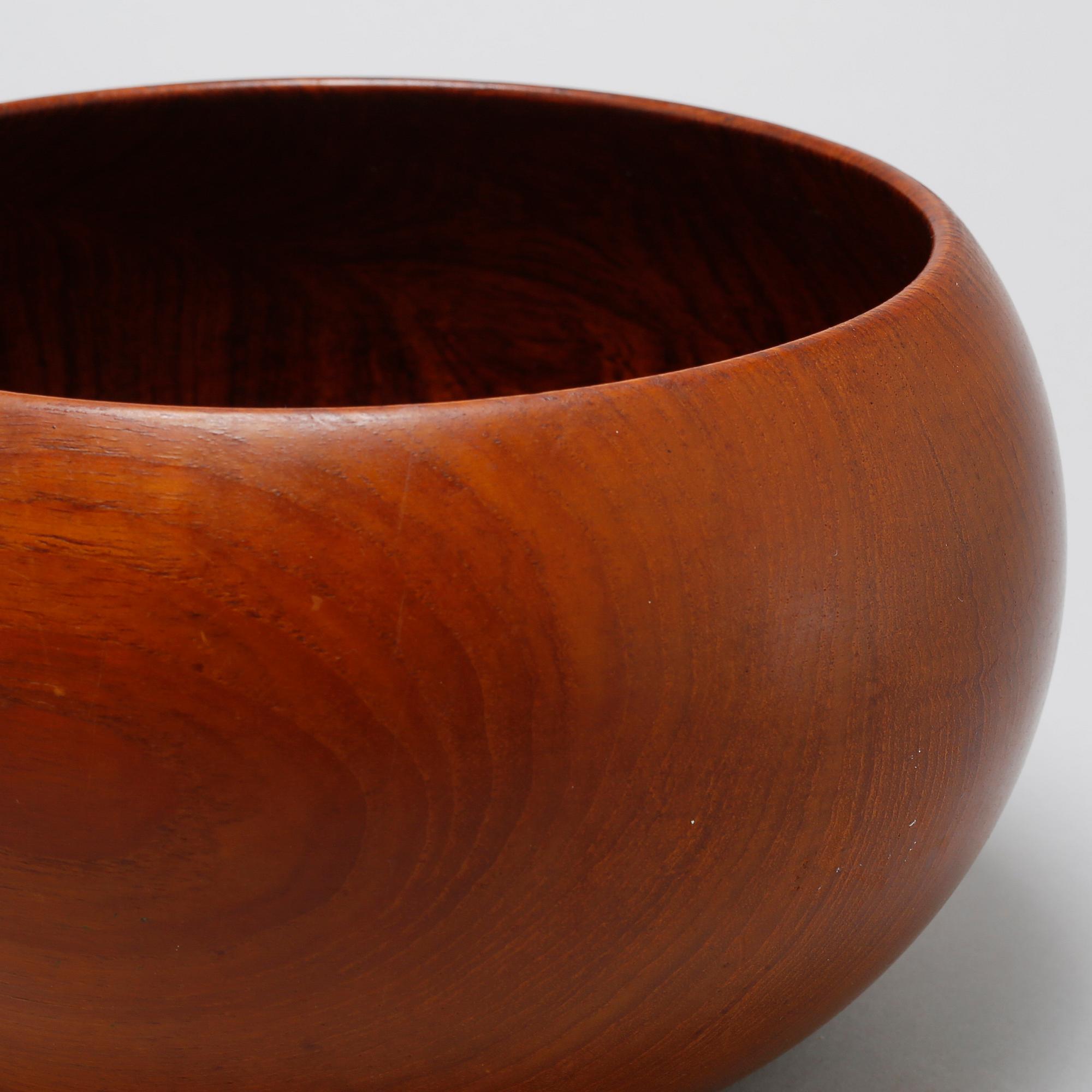 A wooden bowl, designed by Kay Bojesen.