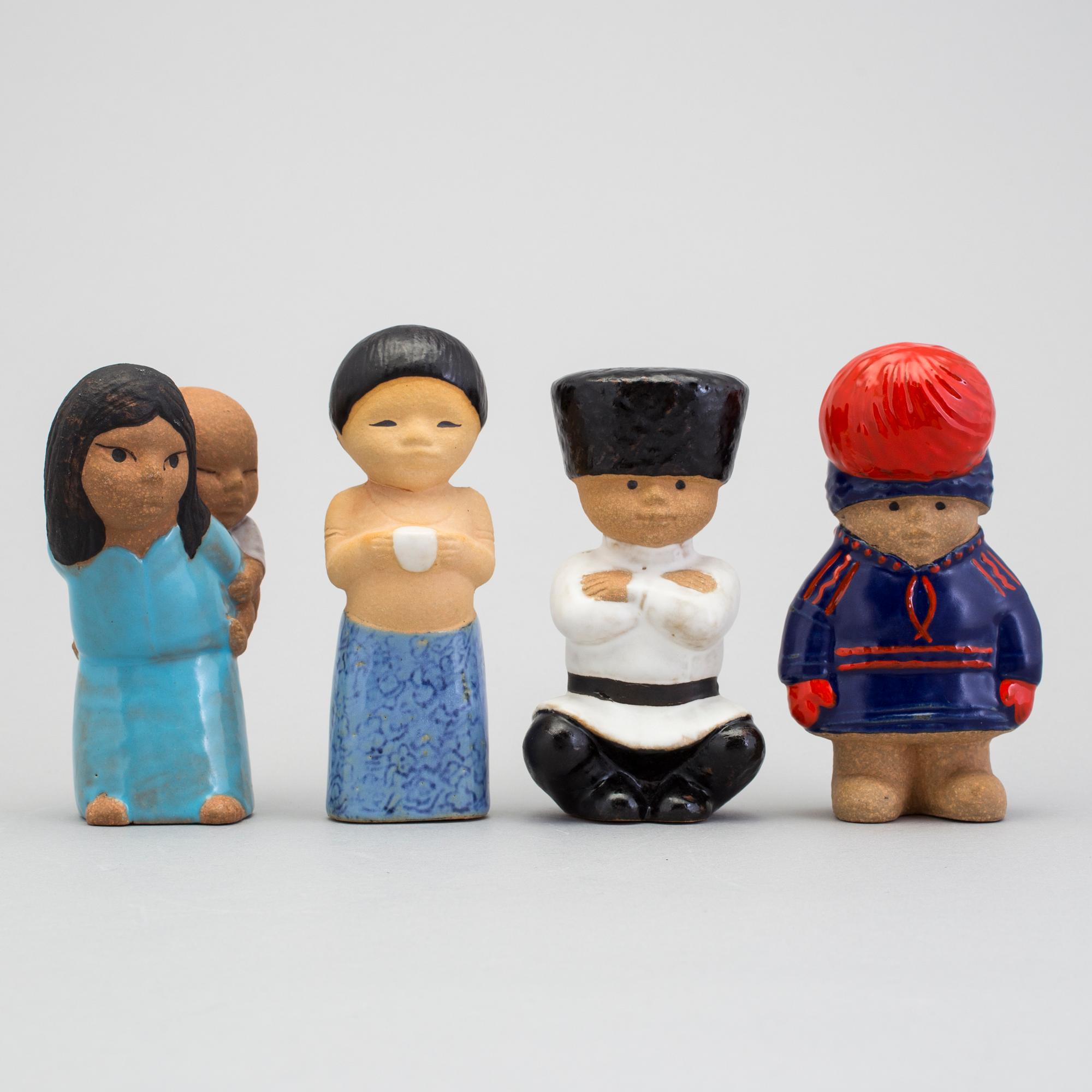 A set of eight stoneware sculptures " All världens barn"  by Lisa Larson, 1974-75.