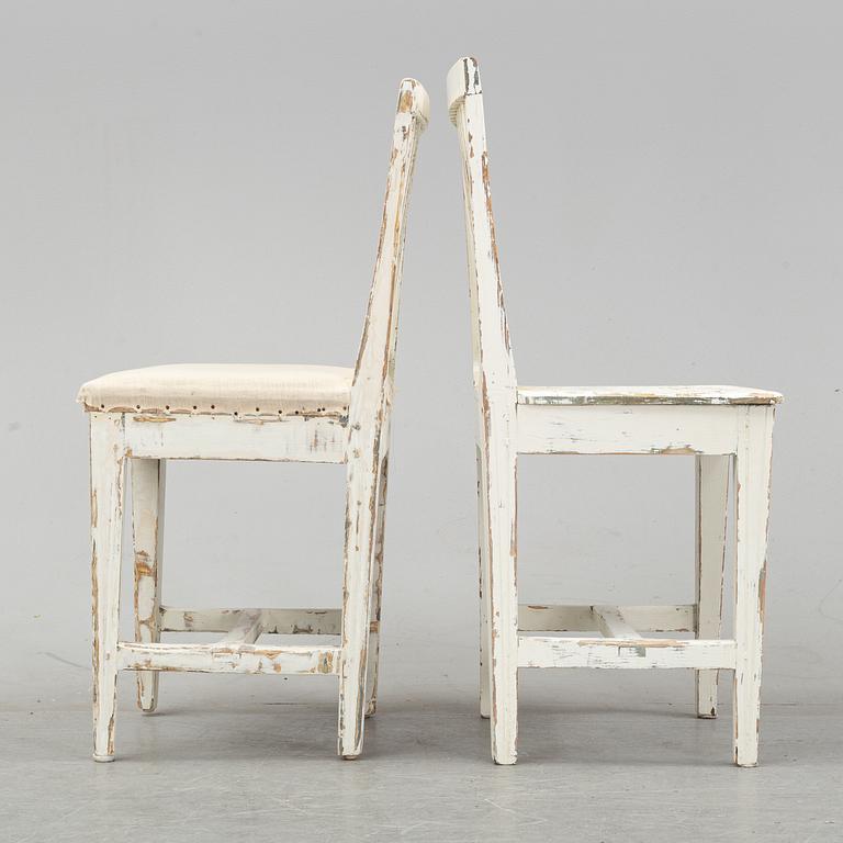 A set of eight painted chairs from the 19th Century.