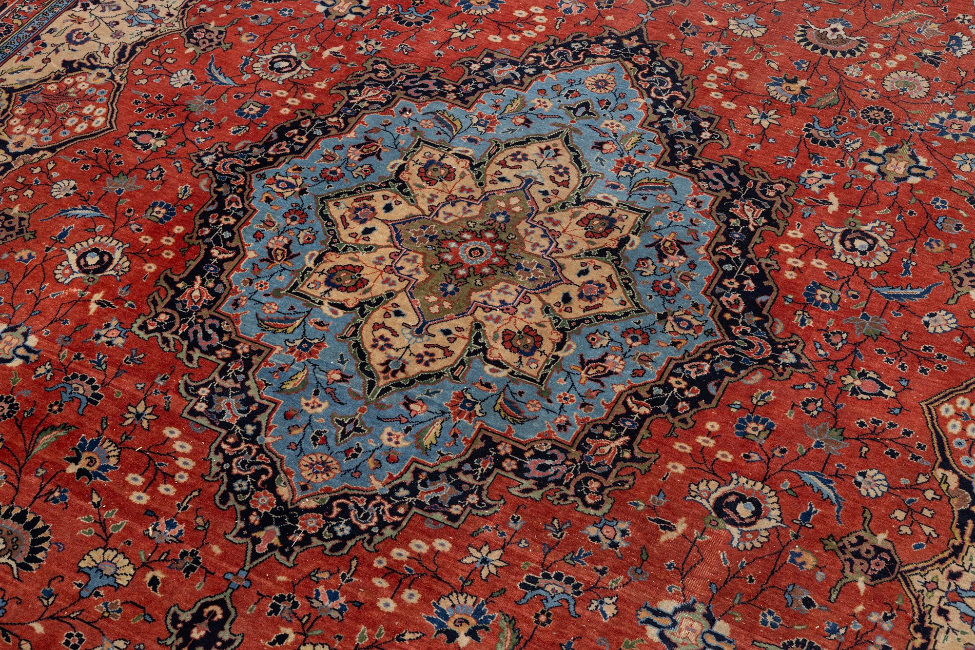 An oriental carpet, c. 370 x 275 cm.