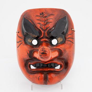 A red-lacquered Tengu mask, Japan, Meiji/Taisho period, early 20th Century.