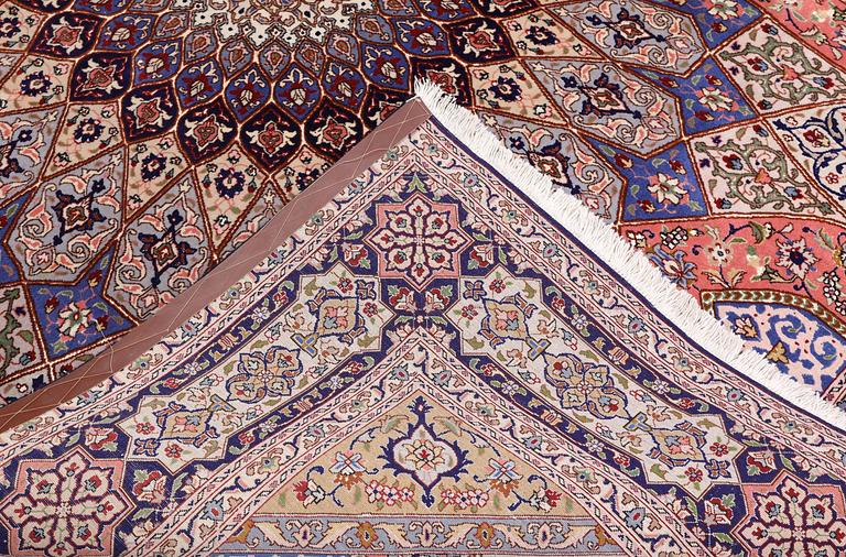 A Tabriz carpet, part silk, so-called 50 Raj, approx. 255 x 200 cm.