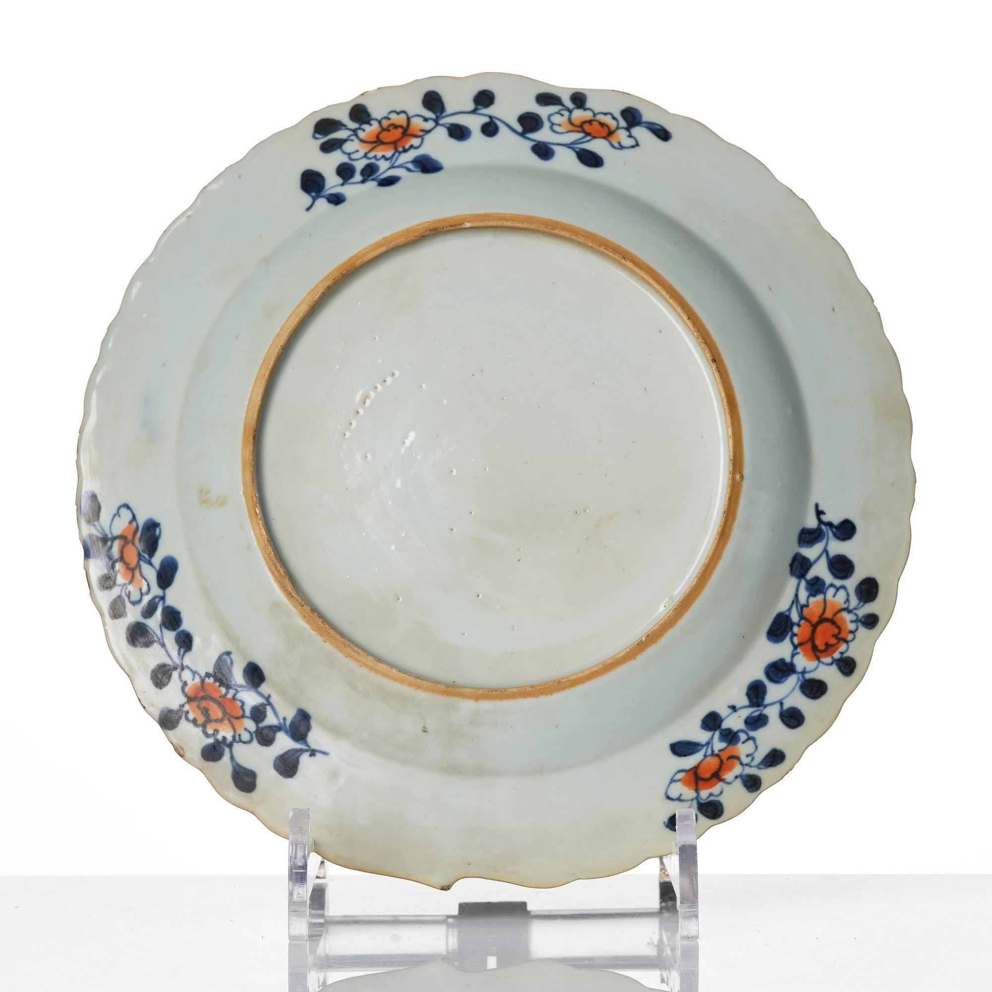 A set of three famille rose 'tobacco leaf' plates, Qing dynasty, Qianlong (1736-95).