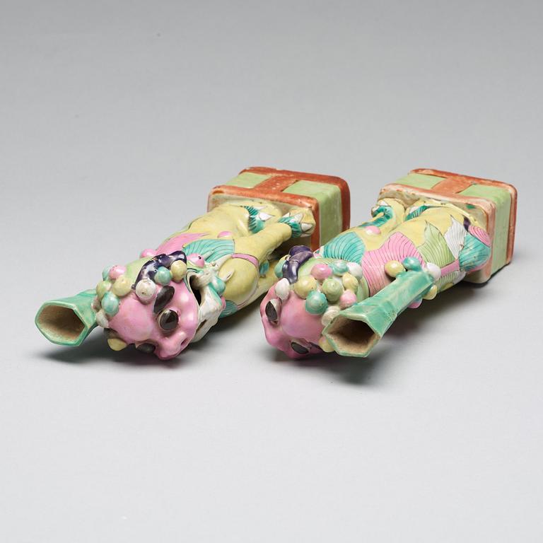 A pair of famille rose joss stick holders, Qing dynasty, circa 1800.