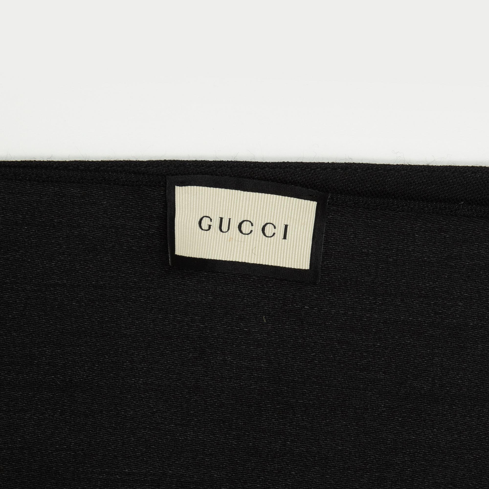 Gucci, a wool and silk mix "GG" jaquard shawl.
