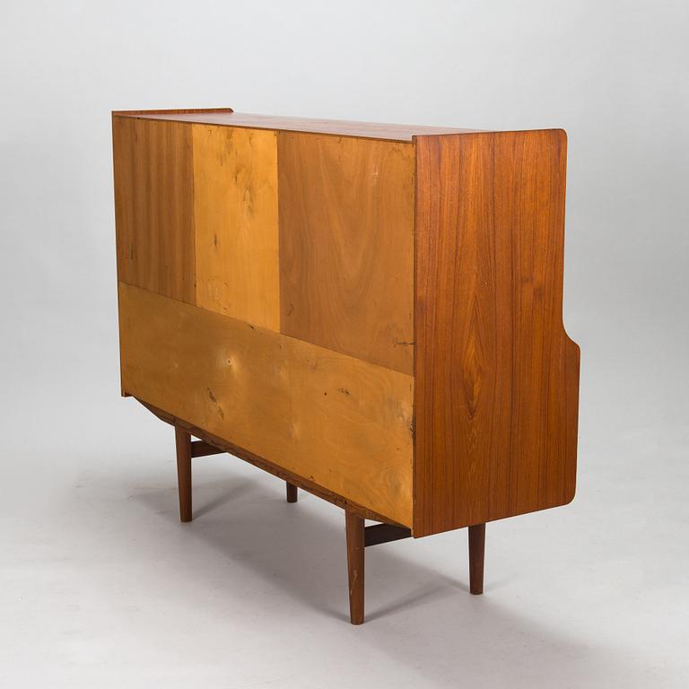 A Danish 1950s-60s cabinet with bar compartment.