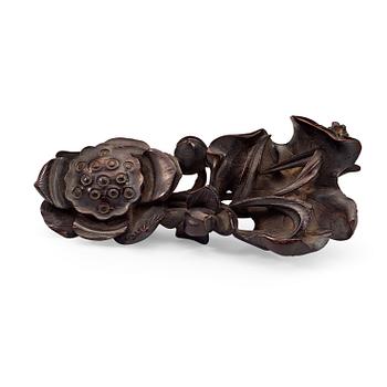 A finely carved Zitan "Lotus" stand, Qing Dynasty (1644-1912).