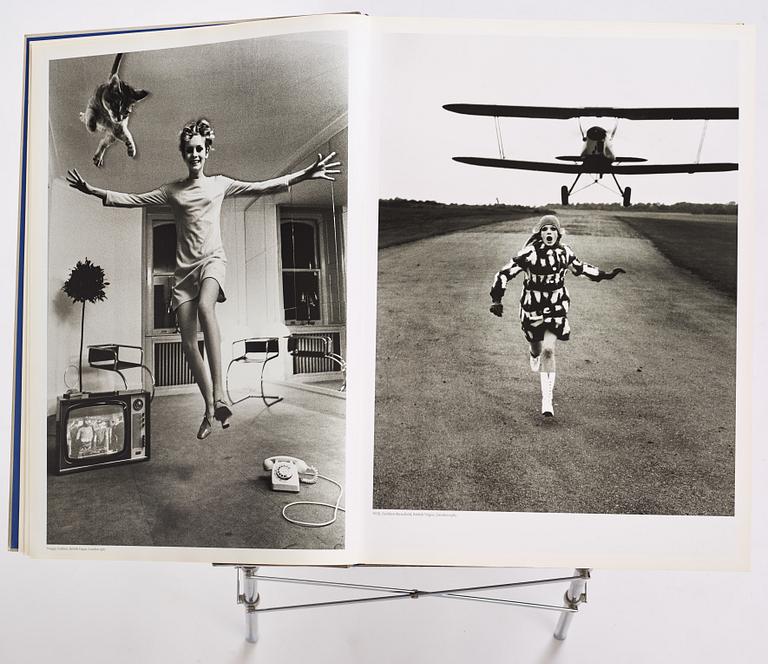 Helmut Newton, Signed book published by Taschen, Monte Carlo, 1999, ed 10000, with a metal table.