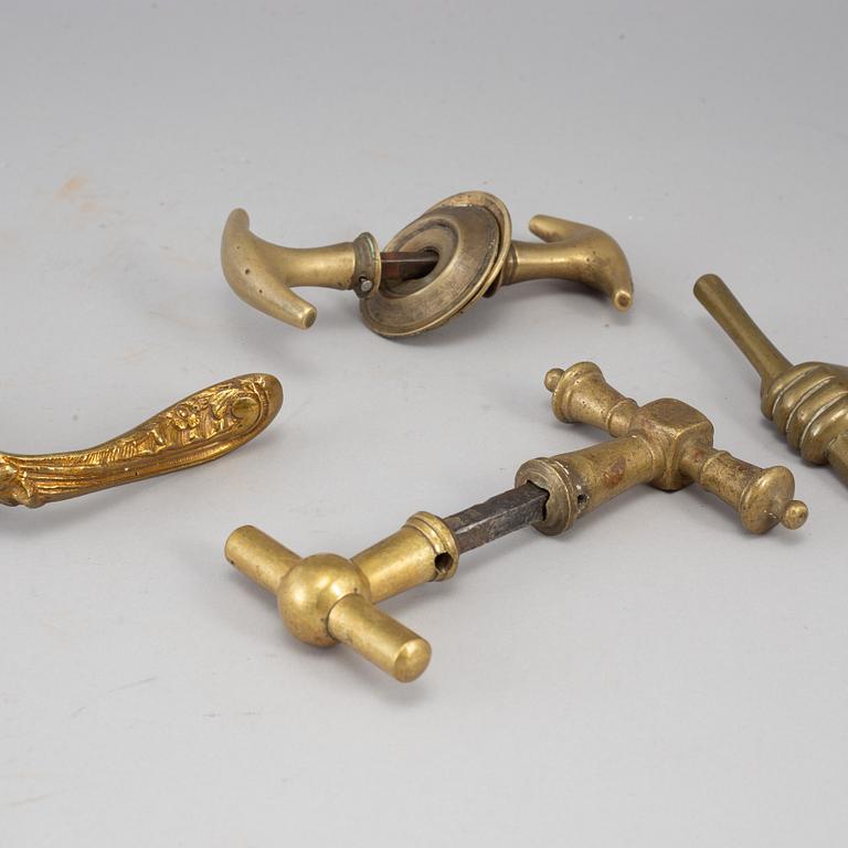 Seven bronze door handles, 19th/20th century.