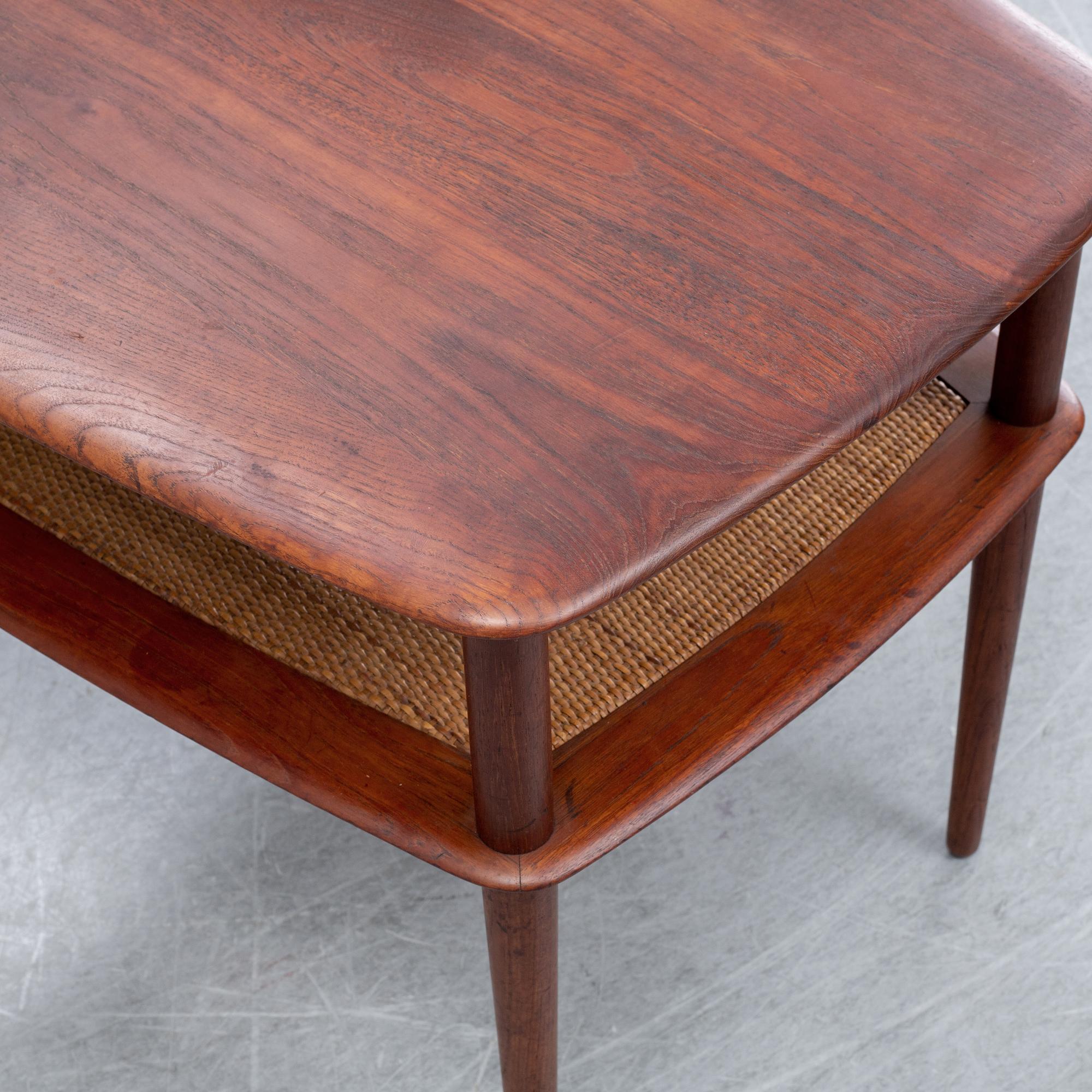 PETER HVIDT & ORLA MØLGAARD NIELSEN, a teak 'Minerva' table, France & Daverkosem, Denmark.