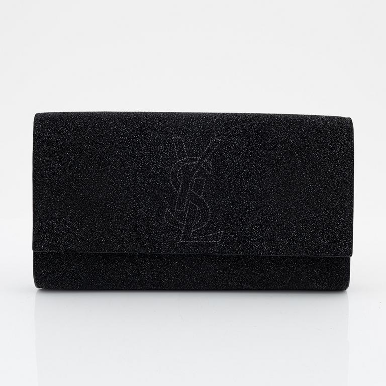 Yves Saint Laurent, a sparkly black leather clutch.
