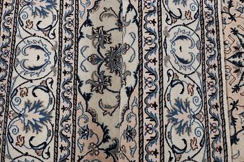 A rug, Nain, part silk, ca 200 x 195 cm.