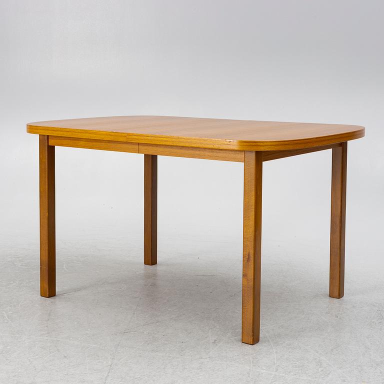 A dining table, 1950s/60s.