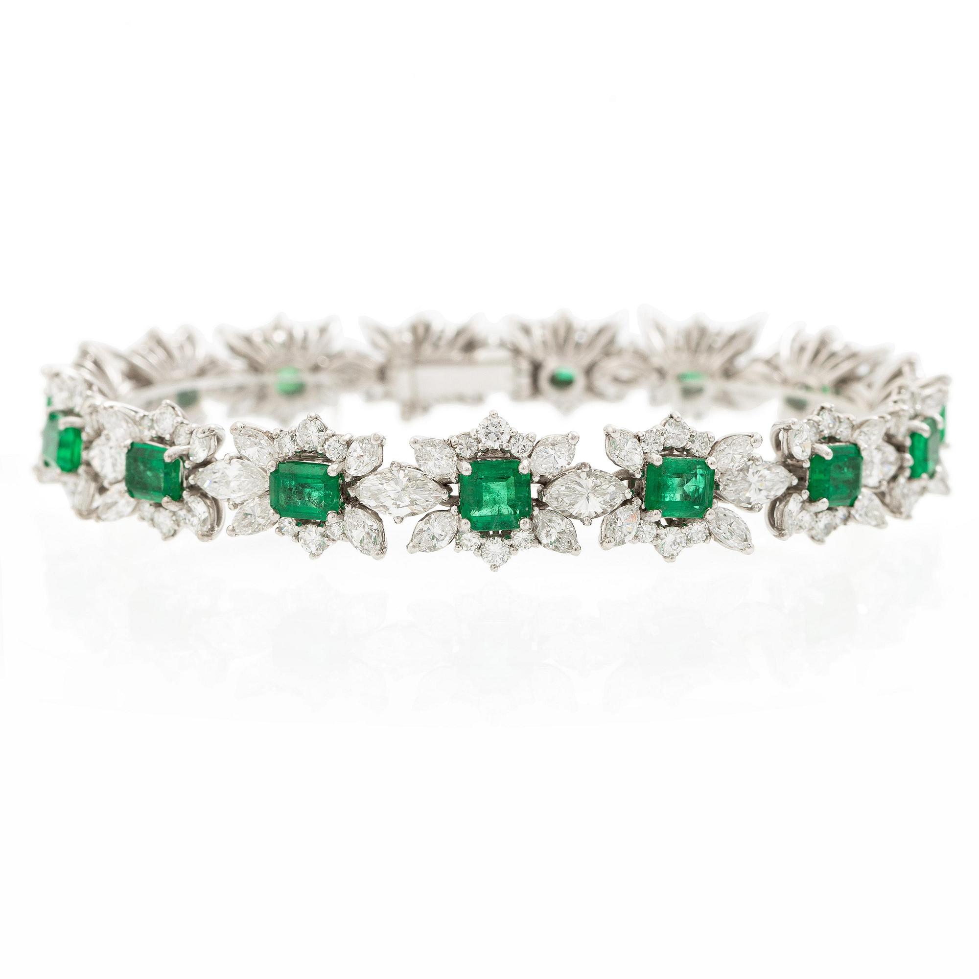 A bracelet in 18K white gold with step-cut emeralds and round and navette-shaped brilliant-cut diamonds.
