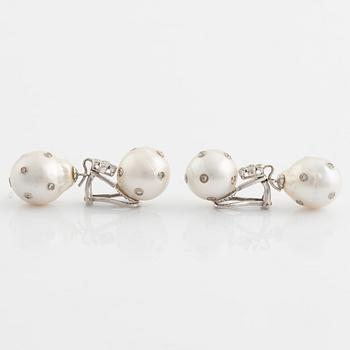 Cultured South sea pearl and brilliant cut diamond earrings.