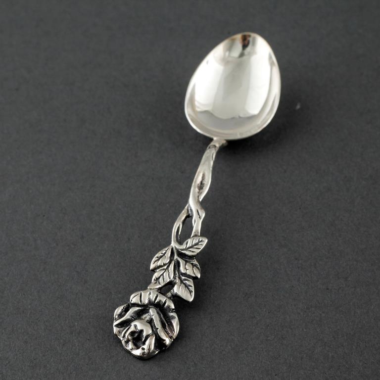 22 swedish silver spoons and one ladle, from the 19th and 20th century.