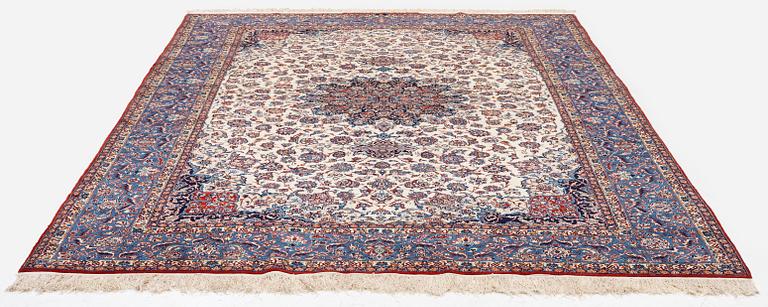 A semi-antique Isfahan carpet, Central Persia, signed (Ali) Seirafian, 328 x 250 cm.