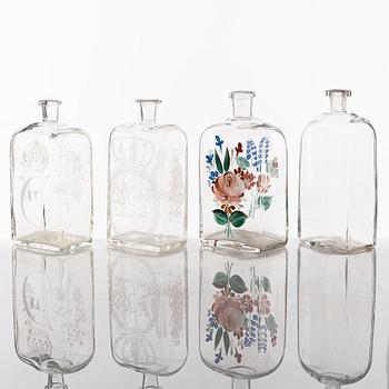 A set of seven glass bottles, 19th Century/circa 1900.