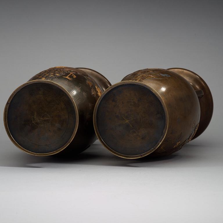 A pair of Japanese bronze vases, Meiji (1868-1912).