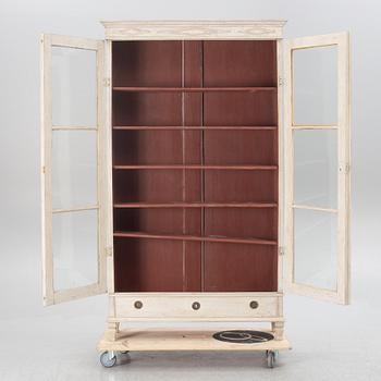 A Gustavian style display cabinet, circa 1900.