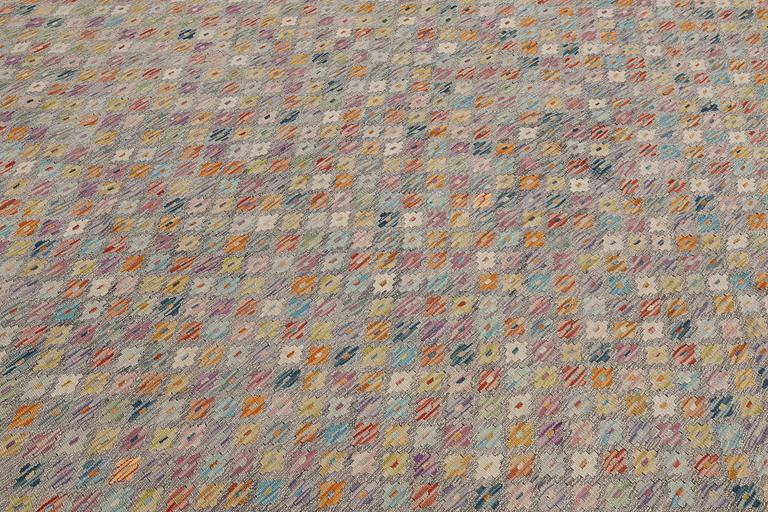 A Kilim carpet, approx. 432 x 368 cm.