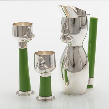 A decanter and snapsglasses "Dudes" in sterling silver and glass. Ru Runeberg 2007.