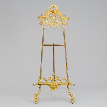 A gilt metal table easle, late 19th Century.