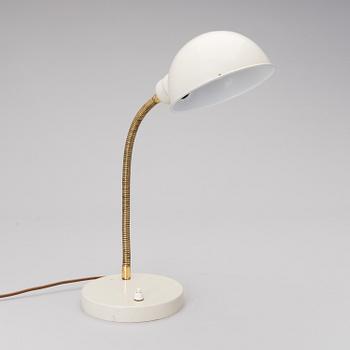 A mid-20th century AK 15 table lamp for Itsu Finland.