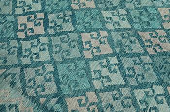 A Kelim carpet, 350 x 245 cm.
