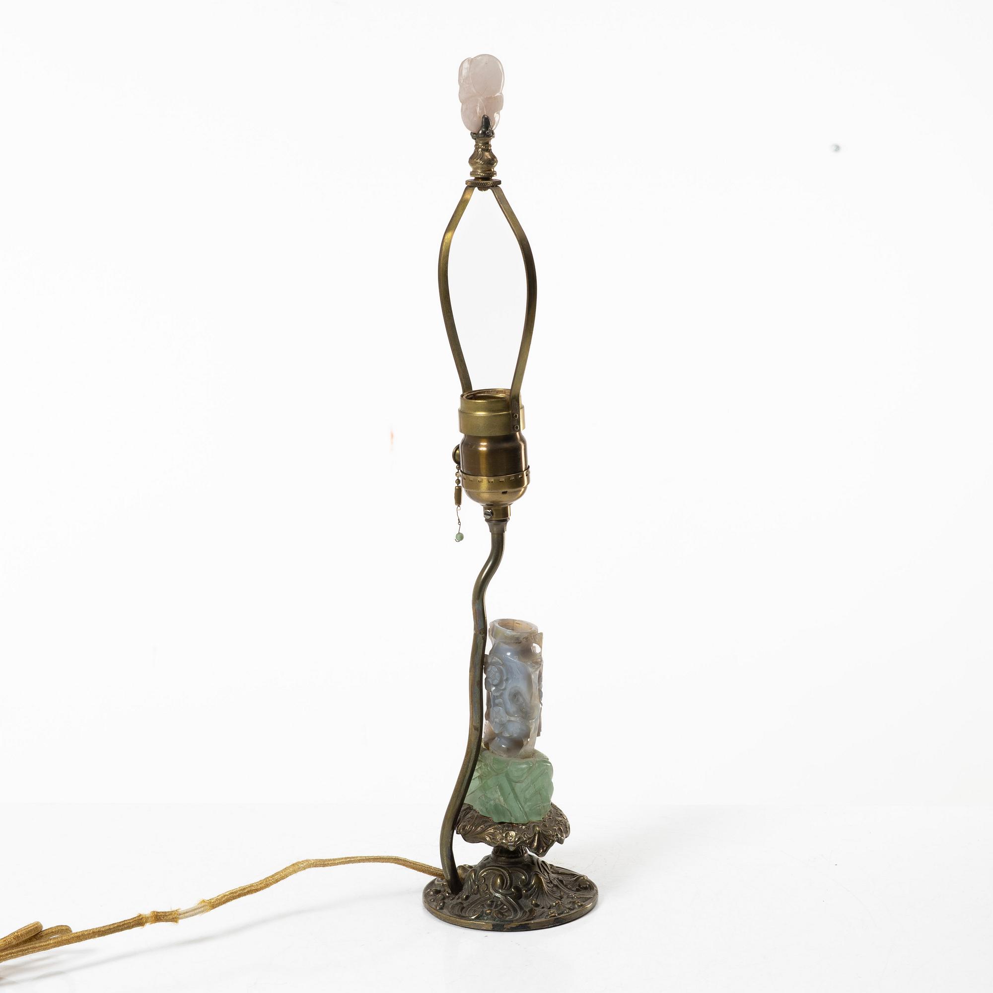 A Chinese table lamp with a carved stone vase with cover, 20th century.